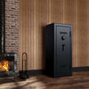 Image of Remington Gun Club fireproof waterproof gun safe in modern setting beside a fireplace.