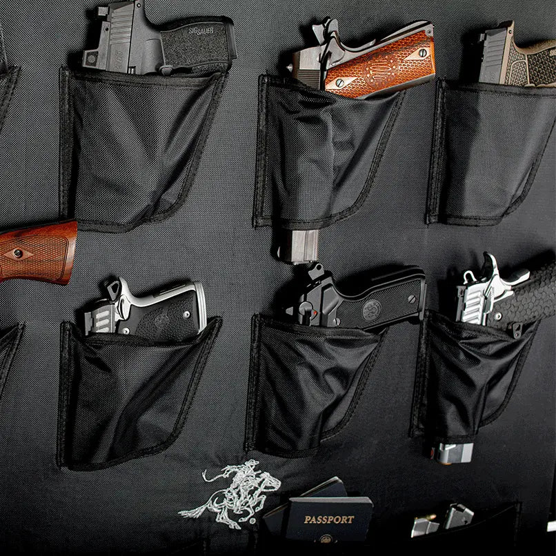 Display of handguns securely stored in black fabric pockets, highlighting efficient firearm organization and accessibility.