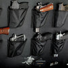 Image of Display of handguns securely stored in black fabric pockets, highlighting efficient firearm organization and accessibility.