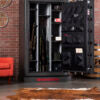 Image of Interior view of the Winchester Legacy 53 fireproof gun safe with electronic lock, showcasing firearm storage and organization.