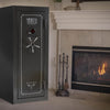 Image of Sports Afield Haven 24-Gun Safe in living room with fireplace, showcasing waterproof and fire-resistant features.
